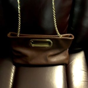 “Charming Charlie”. Crossbody Handbag/ Clutch. Brown